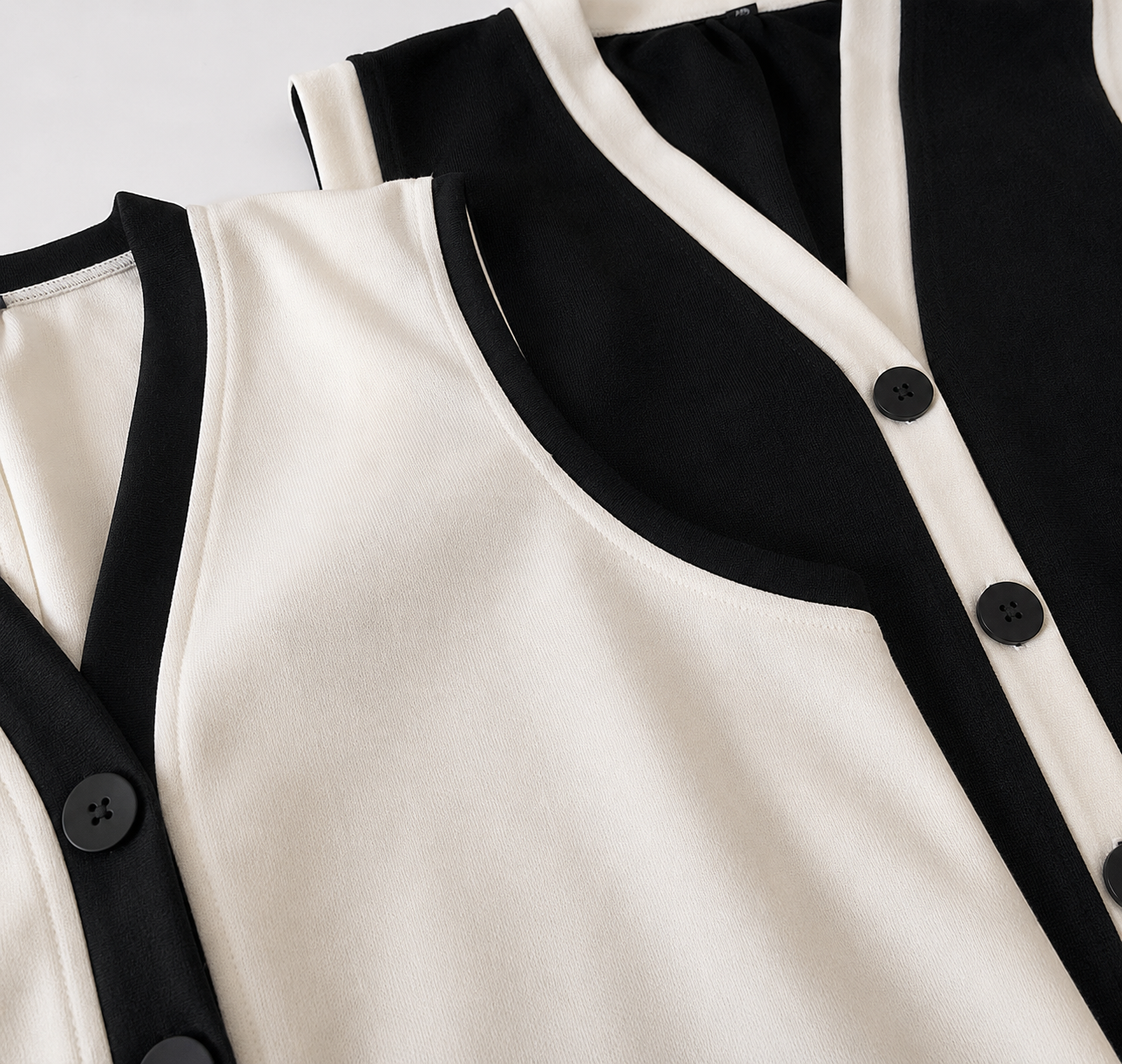 Gilet elegante in maglia bicolore