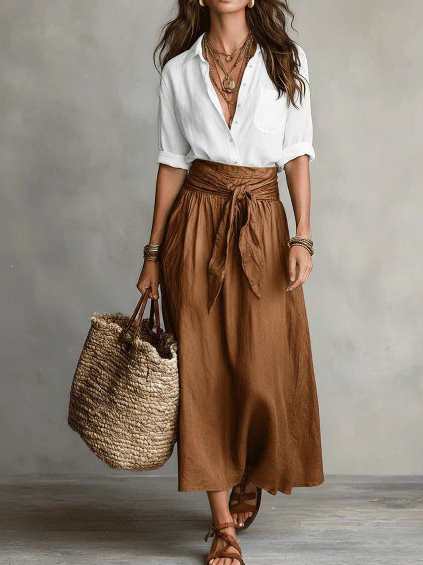 Abito a due pezzi/Top nero e gonna midi