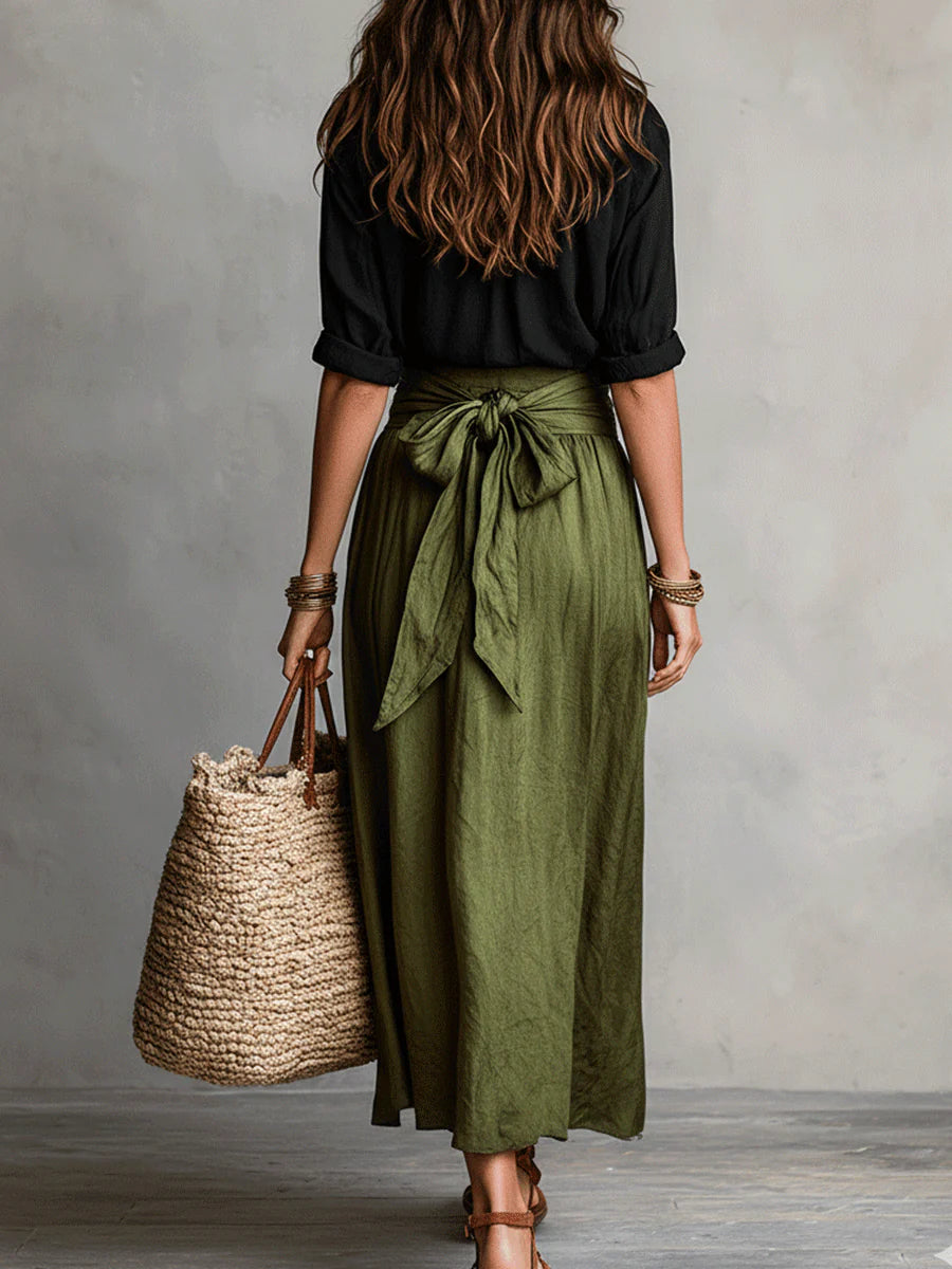 Abito a due pezzi/Top nero e gonna midi