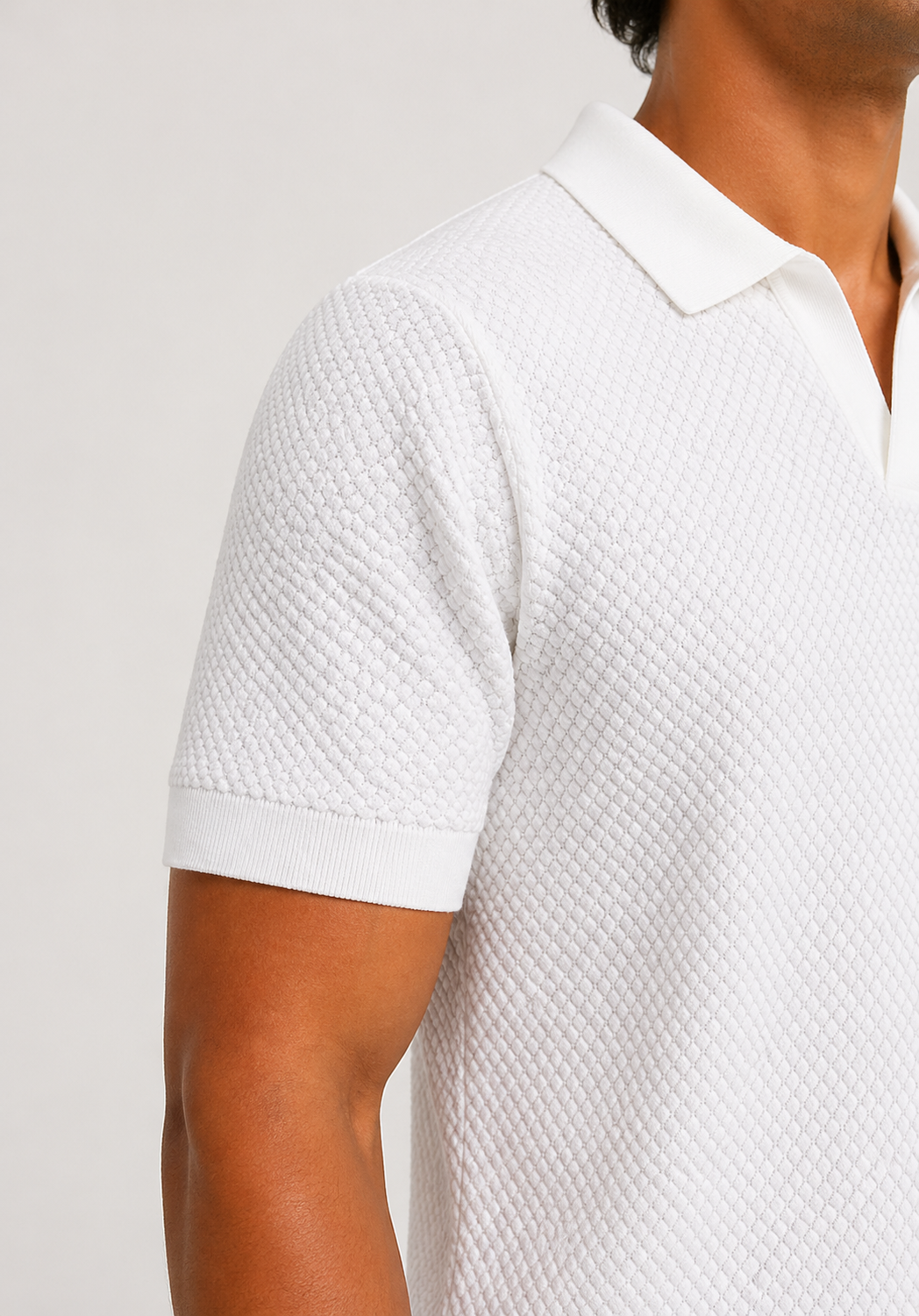 Polo bianco a maniche corte/in maglia testurizzata