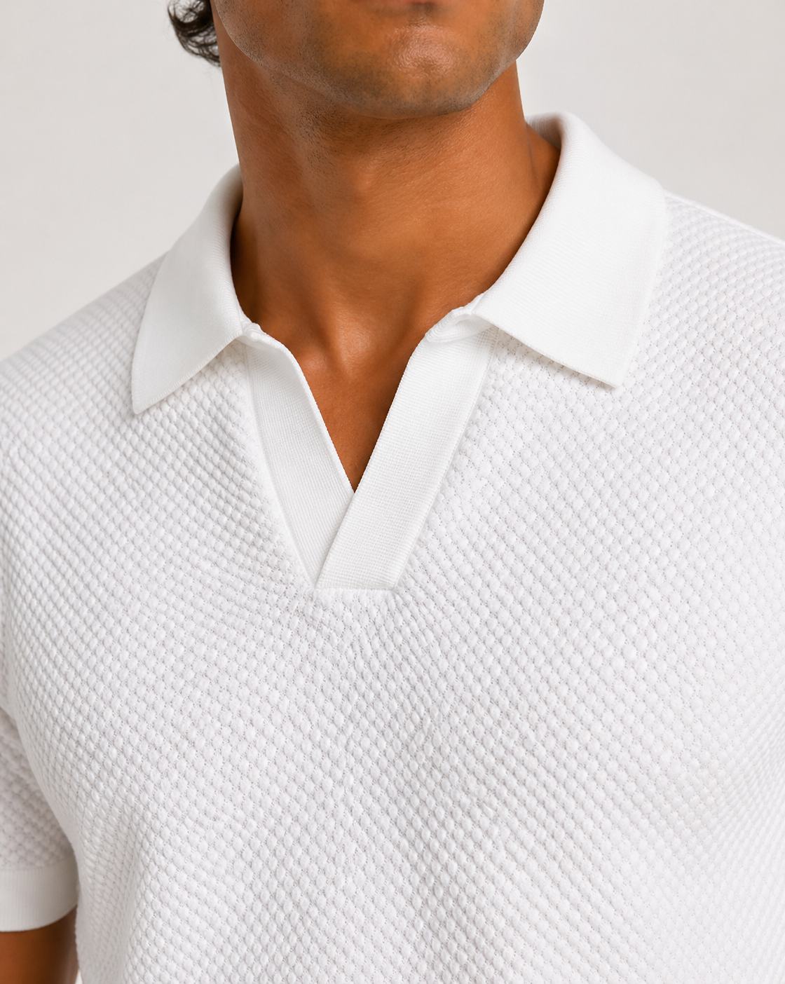 Polo bianco a maniche corte/in maglia testurizzata